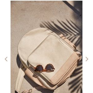 Beis beige backpack by Shayla Mitchell